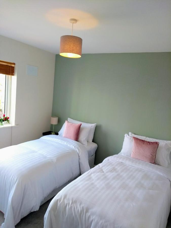Appartamento Rosies Clifden Esterno foto